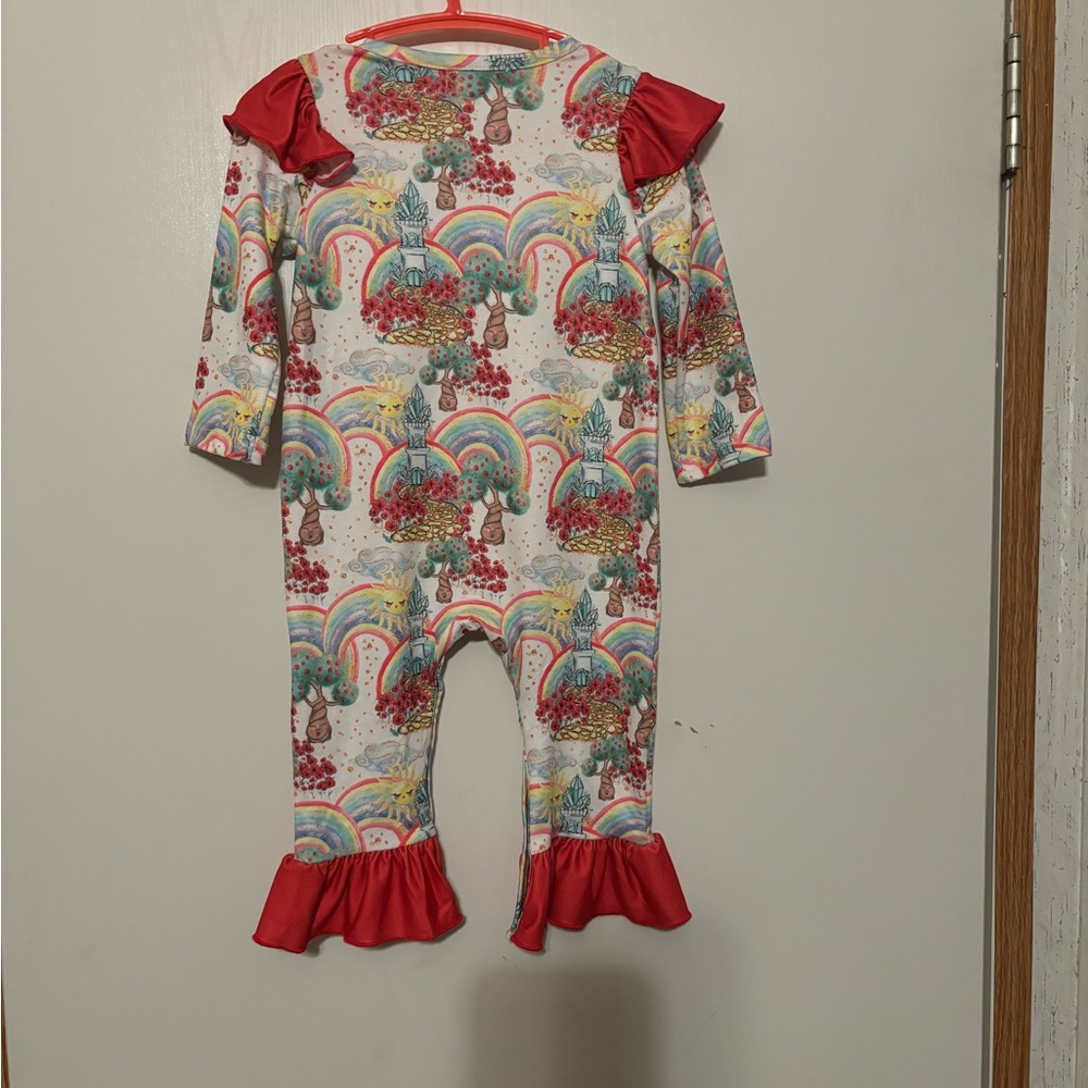 Whimsical Rainbow Kids Romper with Red Ruffles
